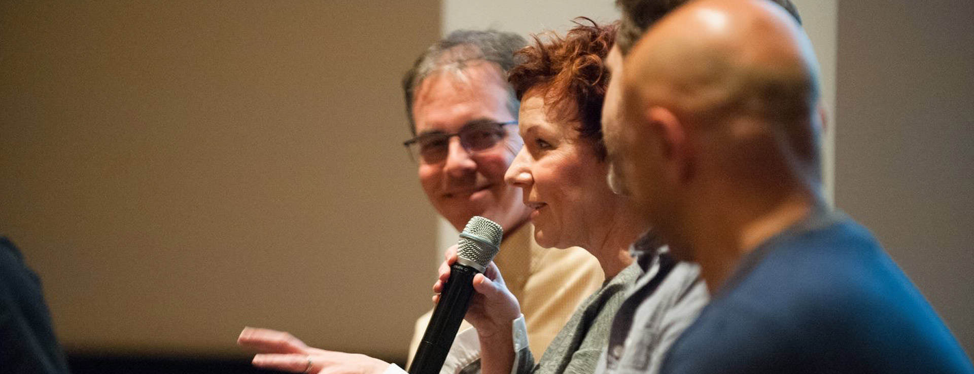 Beth D’Amato talking on a panel