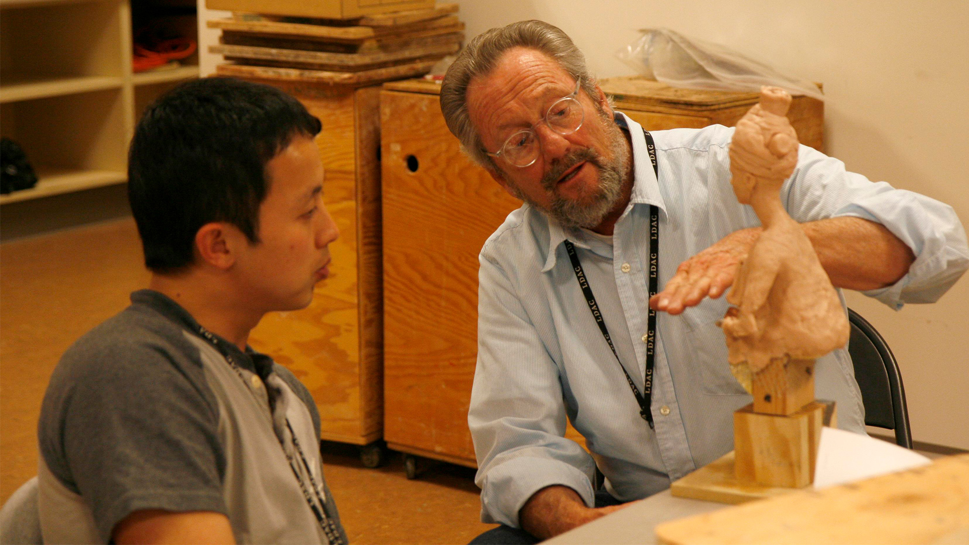 Sculptor Richard Miller and student