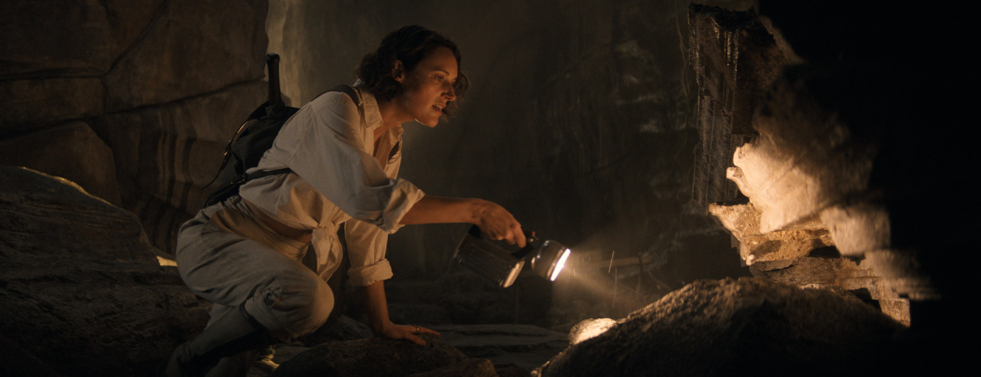 Helena Shaw with a flashlight in Indiana Jones and The Dial of Destiny