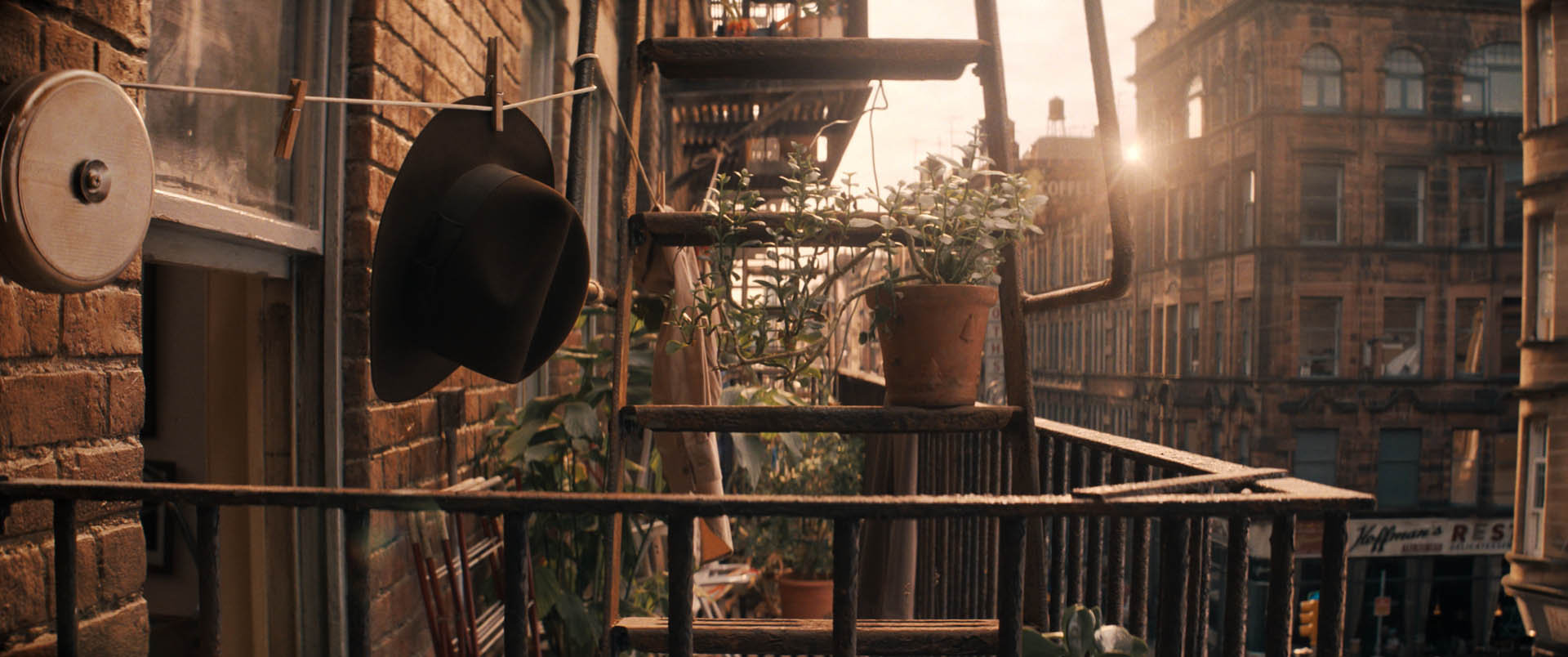 Indiana Jones' hat hung outside on a balcony