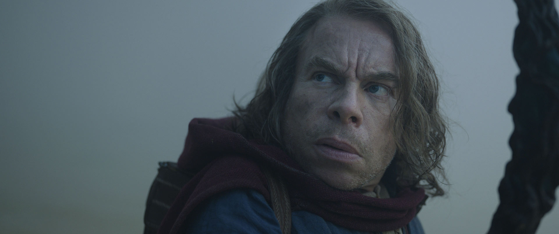 A close up of Warwick Davis as Willow